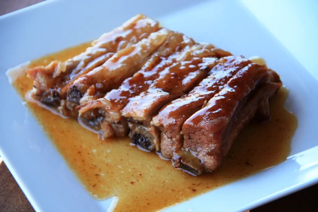 Costillas doradas con su jugo